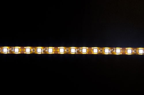 Лента светодиодная, 60SMD(5050)/m 14.4W/m 12V IP65 5m желтый на белом, LS607