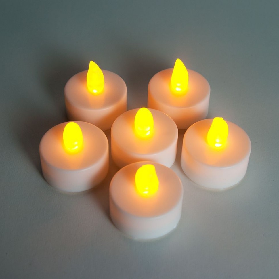 Светодиодные свечи на батарейках 24 штуки , цвет свечения теплый белый